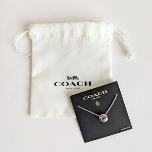 Coach Logo Open Circle Pendant Gray Center Stone Necklace Silver Tone Chain